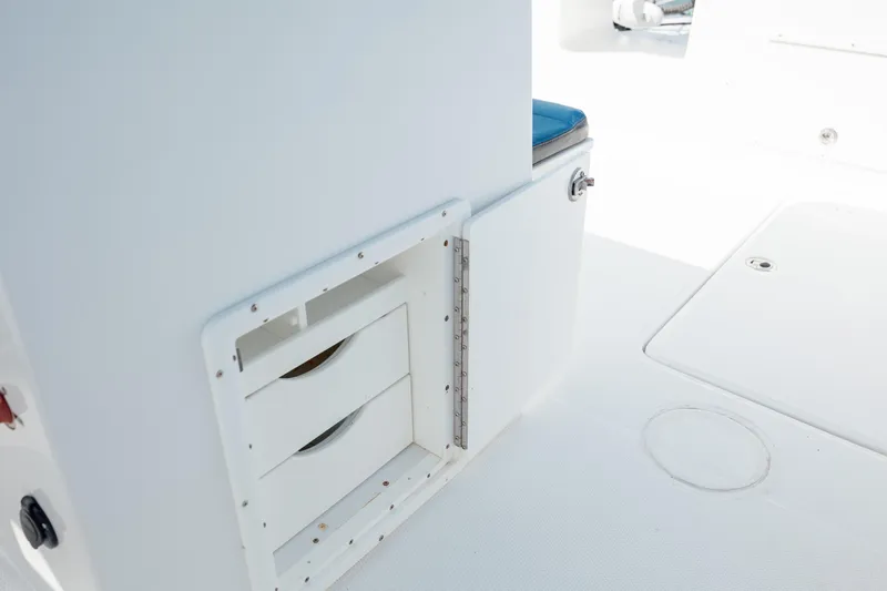  Yacht Photos Pics 2020 Prowler 31 boat interior with storage compartments and seating.