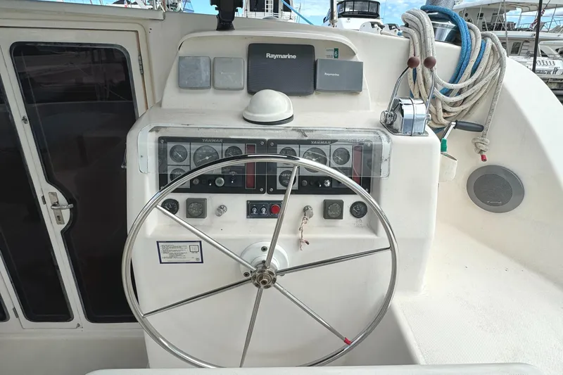 U Turn Yacht Photos Pics Steering wheel and controls of a 2003 Leopard 47 catamaran yacht.