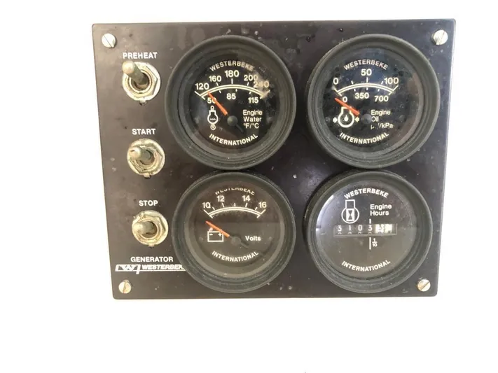 U Turn Yacht Photos Pics Westerbeke generator control panel with gauges and switches, Leopard 47, 2003 model.