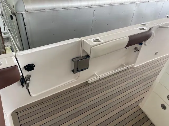  Yacht Photos Pics 2014 Everglades 325 Center Console boat interior with sleek deck and seating.