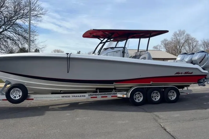  Yacht Photos Pics 2018 Nor-Tech 340 Sport Center Console boat on trailer, side view.