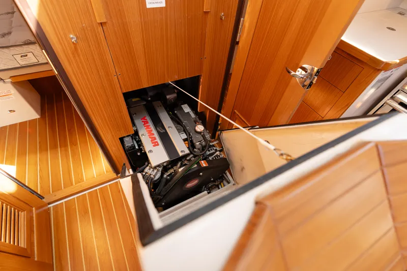 Age Gap Yacht Photos Pics Engine compartment of 2023 Catalina 425 sailboat, featuring a Yanmar engine.