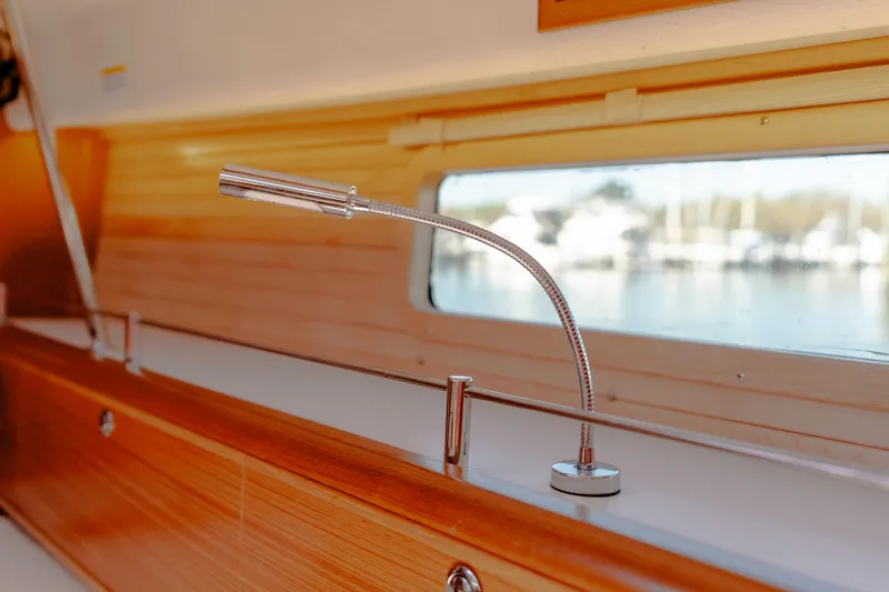 Age Gap Yacht Photos Pics Interior of 2023 Catalina 425 yacht with sleek wooden finish and modern lighting.