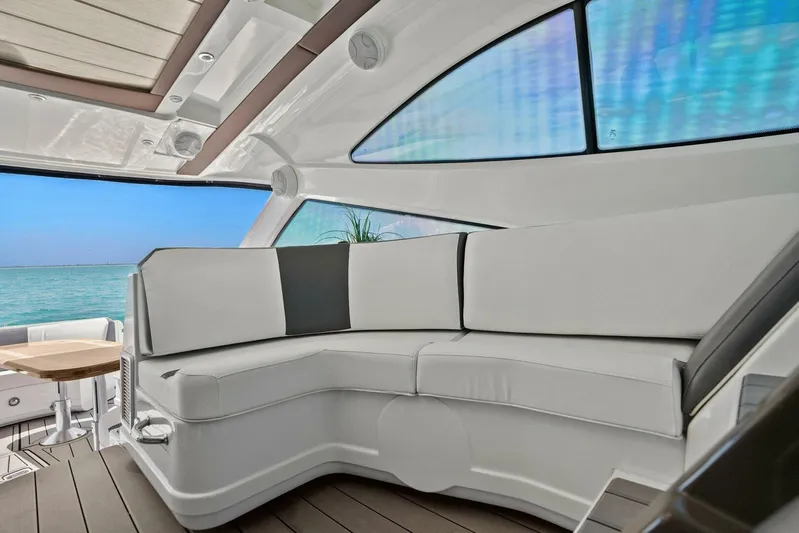 Shoes Knot Allowed Yacht Photos Pics Luxurious interior of 2014 Cruisers Yachts 540 Sports Coupe with ocean view.
