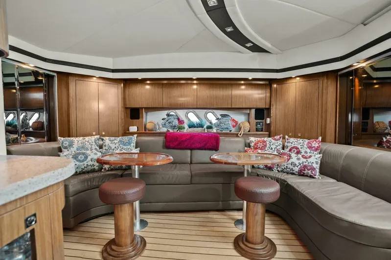 Shoes Knot Allowed Yacht Photos Pics Luxurious interior of 2014 Cruisers Yachts 540 Sports Coupe with plush seating and elegant decor.