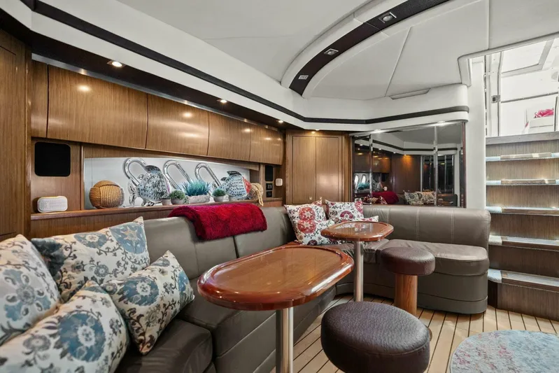 Shoes Knot Allowed Yacht Photos Pics Luxurious interior of 2014 Cruisers Yachts 540 Sports Coupe with elegant seating and decor.