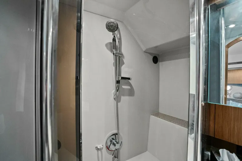 Shoes Knot Allowed Yacht Photos Pics Shower area in 2014 Cruisers Yachts 540 Sports Coupe, featuring modern fixtures and sleek design.