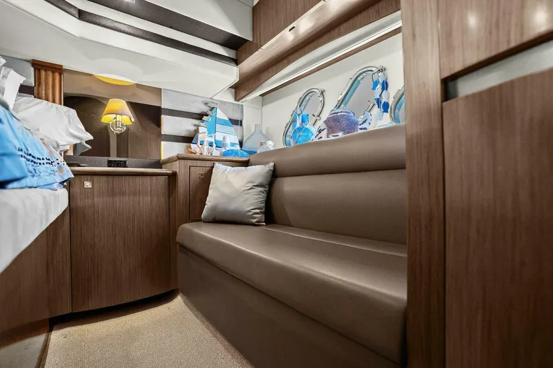 Shoes Knot Allowed Yacht Photos Pics Luxurious interior of 2014 Cruisers Yachts 540 Sports Coupe with elegant seating and decor.