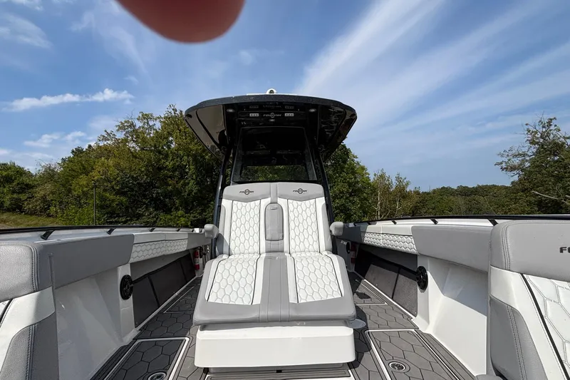  Yacht Photos Pics 2022 Fountain 38 SC boat interior with sleek seating and modern design.