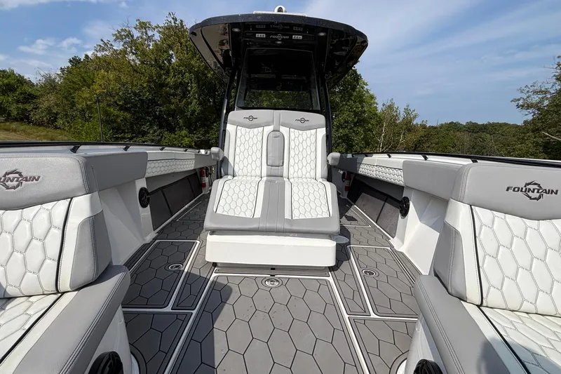  Yacht Photos Pics 2022 Fountain 38 SC boat interior with luxurious seating and modern design.