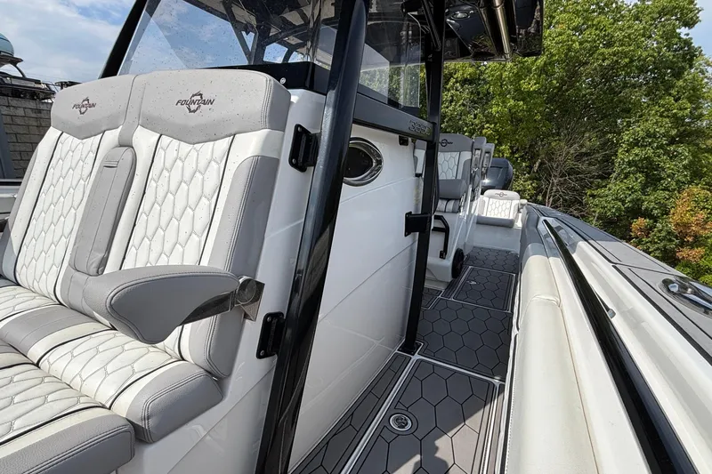  Yacht Photos Pics 2022 Fountain 38 SC boat interior with luxurious seating and modern design.
