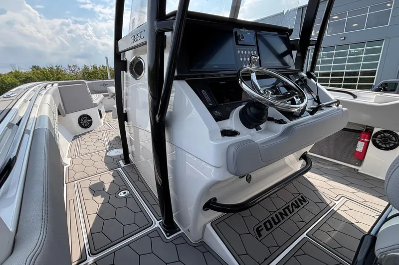  Yacht Photos Pics 2022 Fountain 38 SC boat interior with modern dashboard and sleek design.