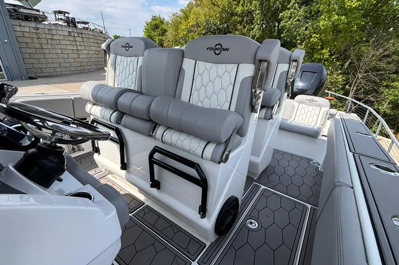  Yacht Photos Pics 2022 Fountain 38 SC boat interior with luxurious seating and modern design.