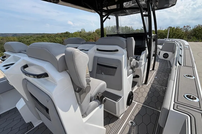  Yacht Photos Pics 2022 Fountain 38 SC boat interior with modern seating and sleek design.