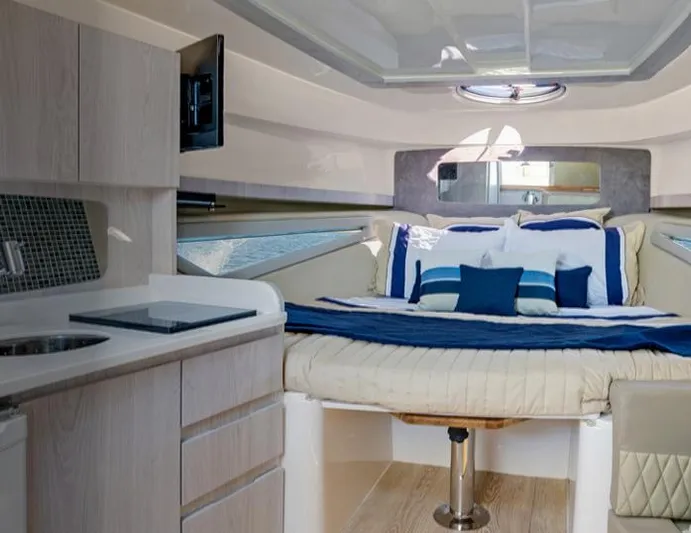 Custom Order You 375 Today! Yacht Photos Pics Luxurious interior of 2025 Hanover 375 Inboard boat with cozy bed and modern amenities.
