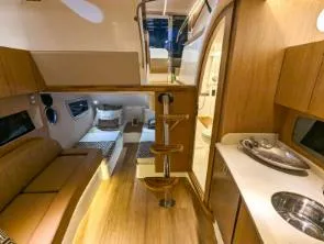 Custom Order You 375 Today! Yacht Photos Pics Luxurious interior of 2025 Hanover 375 Inboard yacht with modern amenities and wooden finishes.