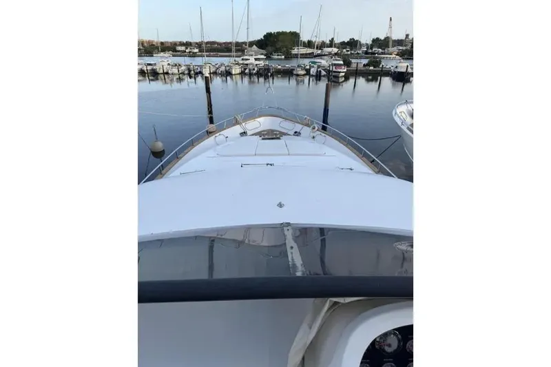  Yacht Photos Pics Maiora 27 yacht from 2009 docked at a marina, view from the deck.