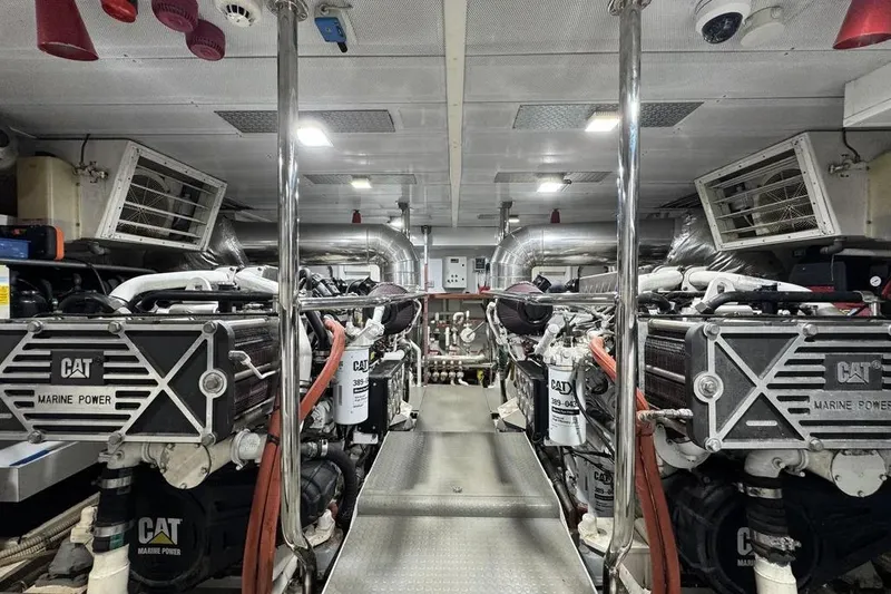  Yacht Photos Pics Engine room of 2009 Maiora 27 yacht with CAT Marine Power engines.