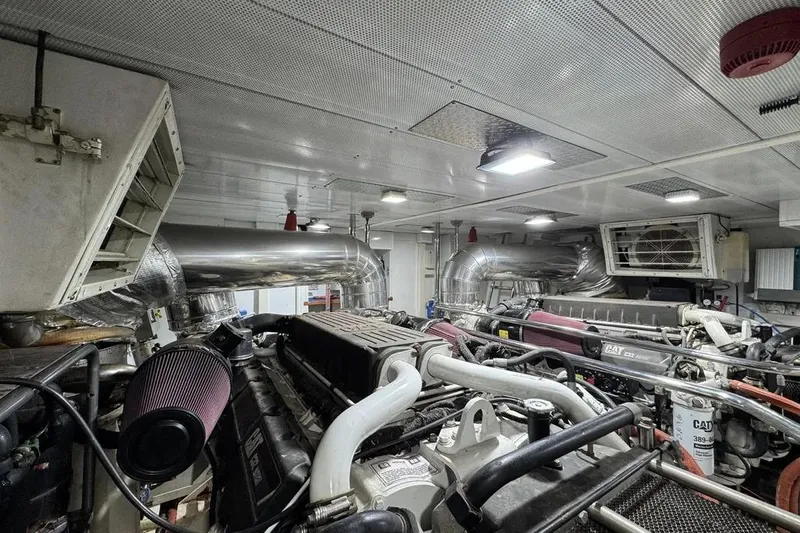  Yacht Photos Pics Engine room of 2009 Maiora 27 yacht with CAT engines and ventilation system.