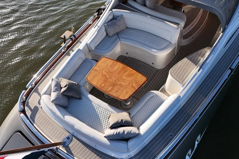 La Koko Yacht Photos Pics Luxurious 2012 Zeelander Z44 yacht deck with elegant seating and wooden table.