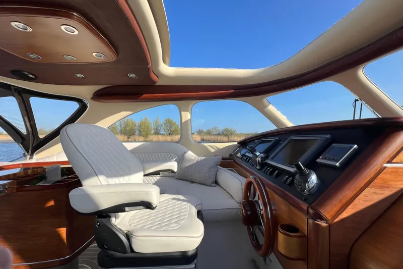 La Koko Yacht Photos Pics Luxurious interior of 2012 Zeelander Z44 yacht with elegant wood and leather finishes.