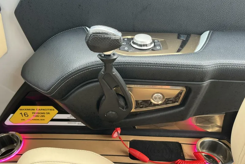  Yacht Photos Pics 2022 Nautique Super Air Nautique G23 control panel with throttle and capacity label.