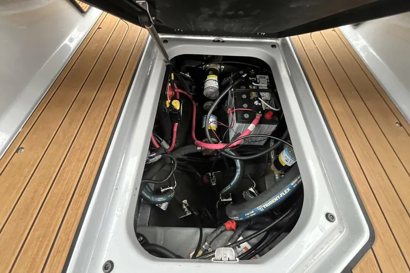  Yacht Photos Pics Engine compartment of 2022 Nautique Super Air Nautique G23 with visible wiring and components.