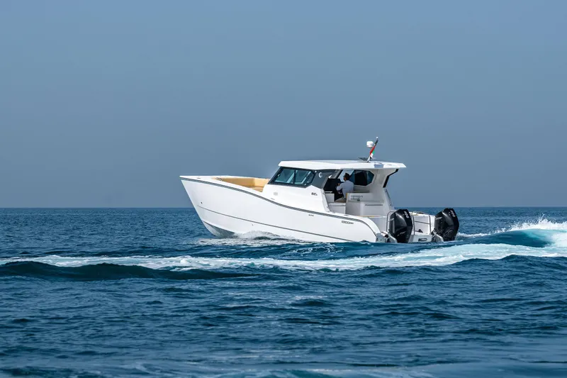  Yacht Photos Pics 2026 SilverCAT 34HT boat cruising on open sea, showcasing sleek design and powerful engines.