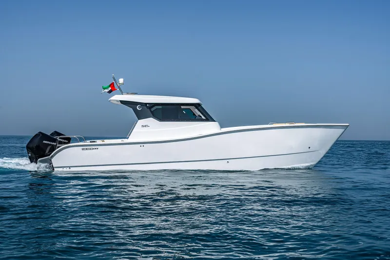  Yacht Photos Pics 2026 SilverCAT 34HT boat cruising on open water under clear blue sky.