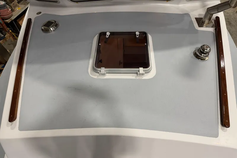 Chad-m Yacht Photos Pics Covey Island 38 Lobster Yacht 2022 deck with hatch and winch.