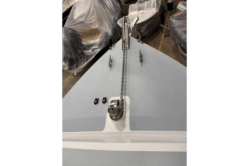 Chad-m Yacht Photos Pics Bow view of 2022 Covey Island 38 Lobster Yacht in storage.