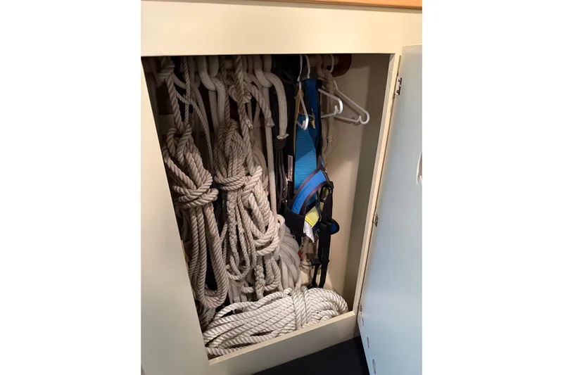 Chad-m Yacht Photos Pics Storage cabinet with ropes and harness on a 2022 Covey Island 38 Lobster Yacht.