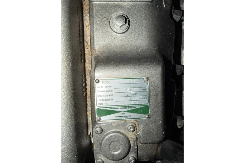 Chad-m Yacht Photos Pics Engine plate of a 2022 Covey Island 38 Lobster Yacht, displaying specifications.