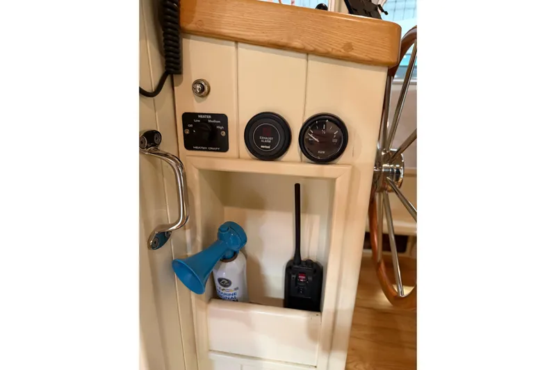 Chad-m Yacht Photos Pics Control panel of 2022 Covey Island 38 Lobster Yacht with gauges and radio.