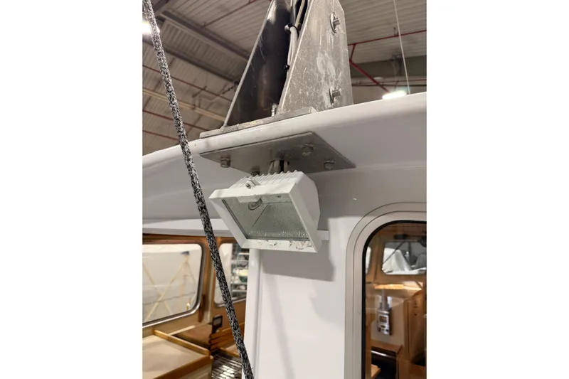 Chad-m Yacht Photos Pics Exterior detail of 2022 Covey Island 38 Lobster Yacht, showcasing a mounted light fixture.