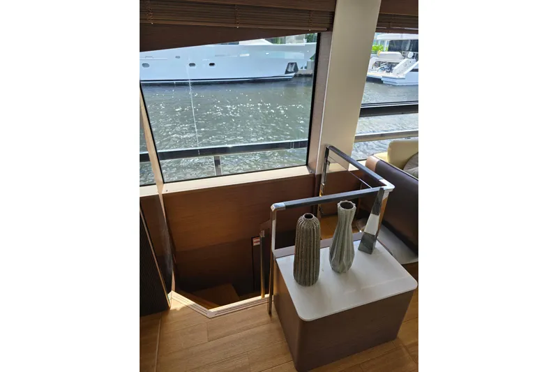  Yacht Photos Pics Interior of 2022 Prestige X70 yacht with elegant decor and waterfront view.