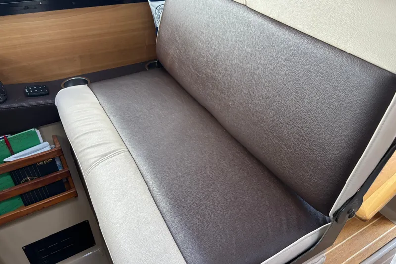  Yacht Photos Pics Brown and beige leather seating in 2013 Cutwater C-28 boat interior.