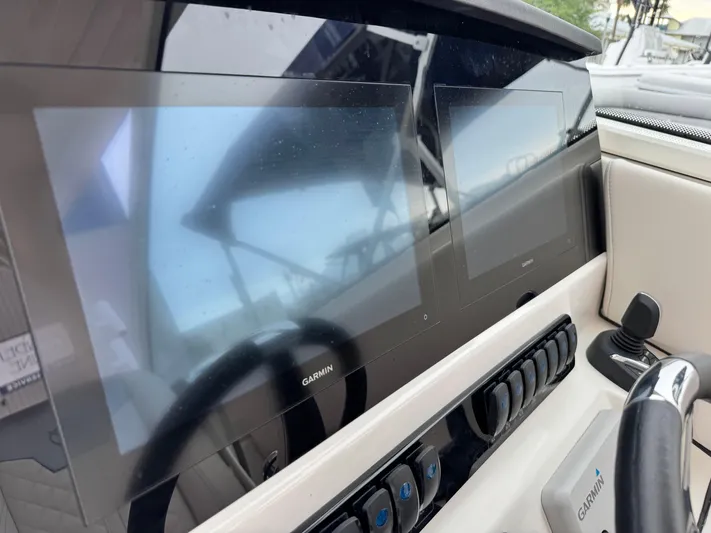  Yacht Photos Pics 2025 Sailfish 316 DC dashboard with Garmin displays and controls.