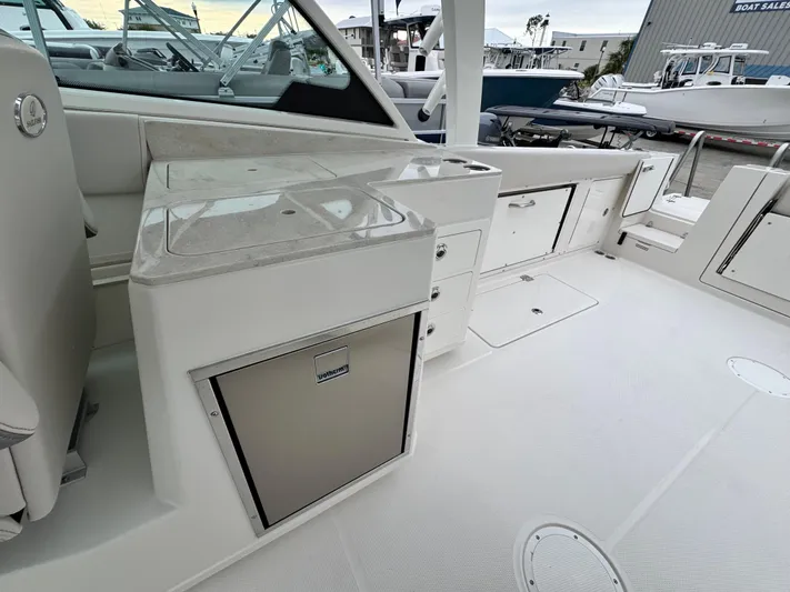  Yacht Photos Pics 2025 Sailfish 316 DC boat interior with sleek design and modern amenities.