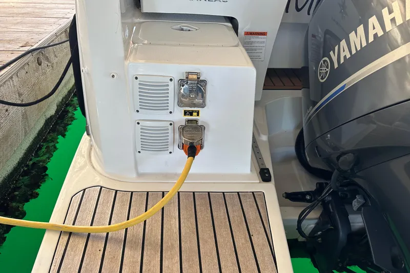 Mauka Makai Yacht Photos Pics 2021 Jeanneau NC 895 boat with Yamaha engine and power connection.