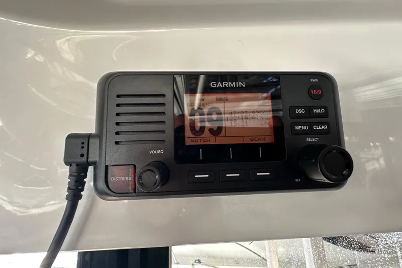 Mauka Makai Yacht Photos Pics Garmin marine radio on 2021 Jeanneau NC 895 boat dashboard.