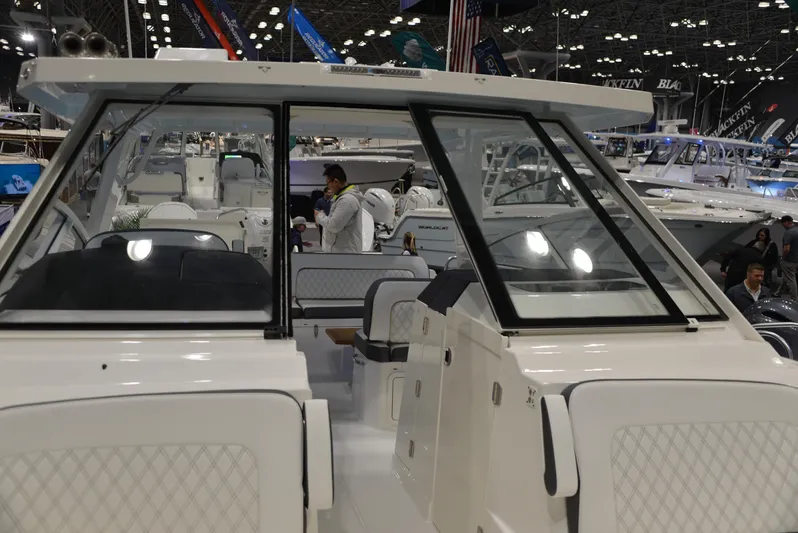  Yacht Photos Pics 2023 World Cat 400DC-X boat interior at a boat show, showcasing sleek design and modern features.
