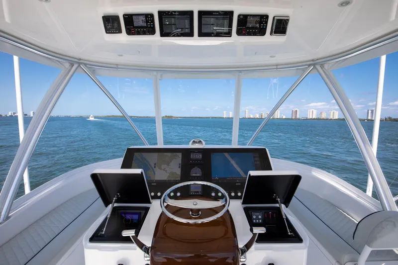 Can Do Yacht Photos Pics Cockpit view of 2023 Viking 46 Billfish yacht with modern navigation systems.