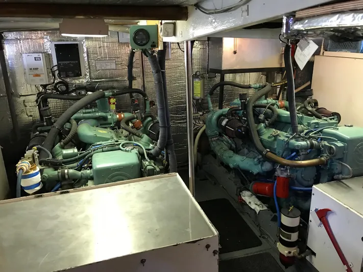  Yacht Photos Pics Engine room of 1977 Monk McQueen 72 CPMY yacht with dual engines and equipment.