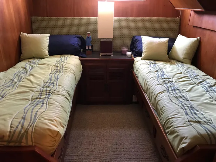  Yacht Photos Pics Cozy twin cabin beds in a 1977 Monk McQueen 72 CPMY yacht.