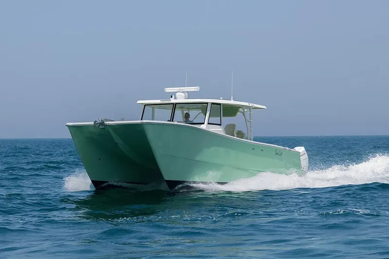  Yacht Photos Pics SilverCAT 40CC ULTRA 2026 catamaran cruising on open sea, showcasing sleek design and performance.