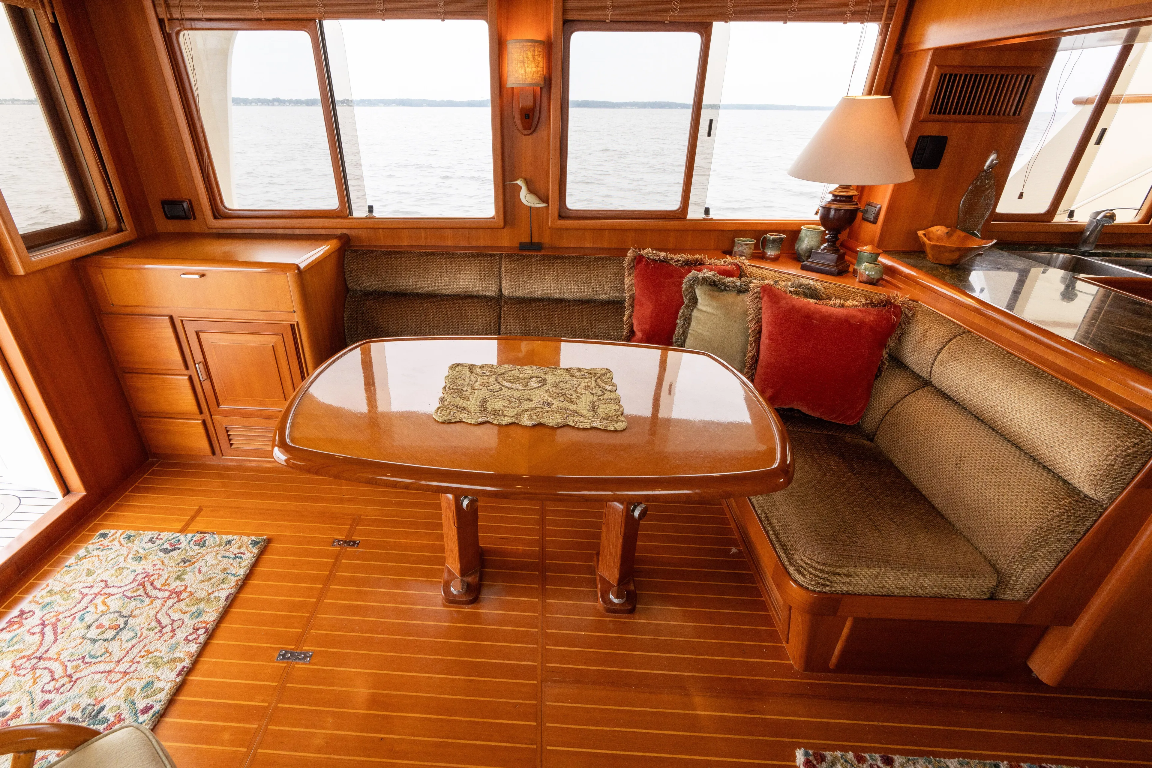Fiddlesticks Yacht Photos Pics Luxurious 2007 Fleming 55 yacht interior with elegant wood finish and cozy seating area.
