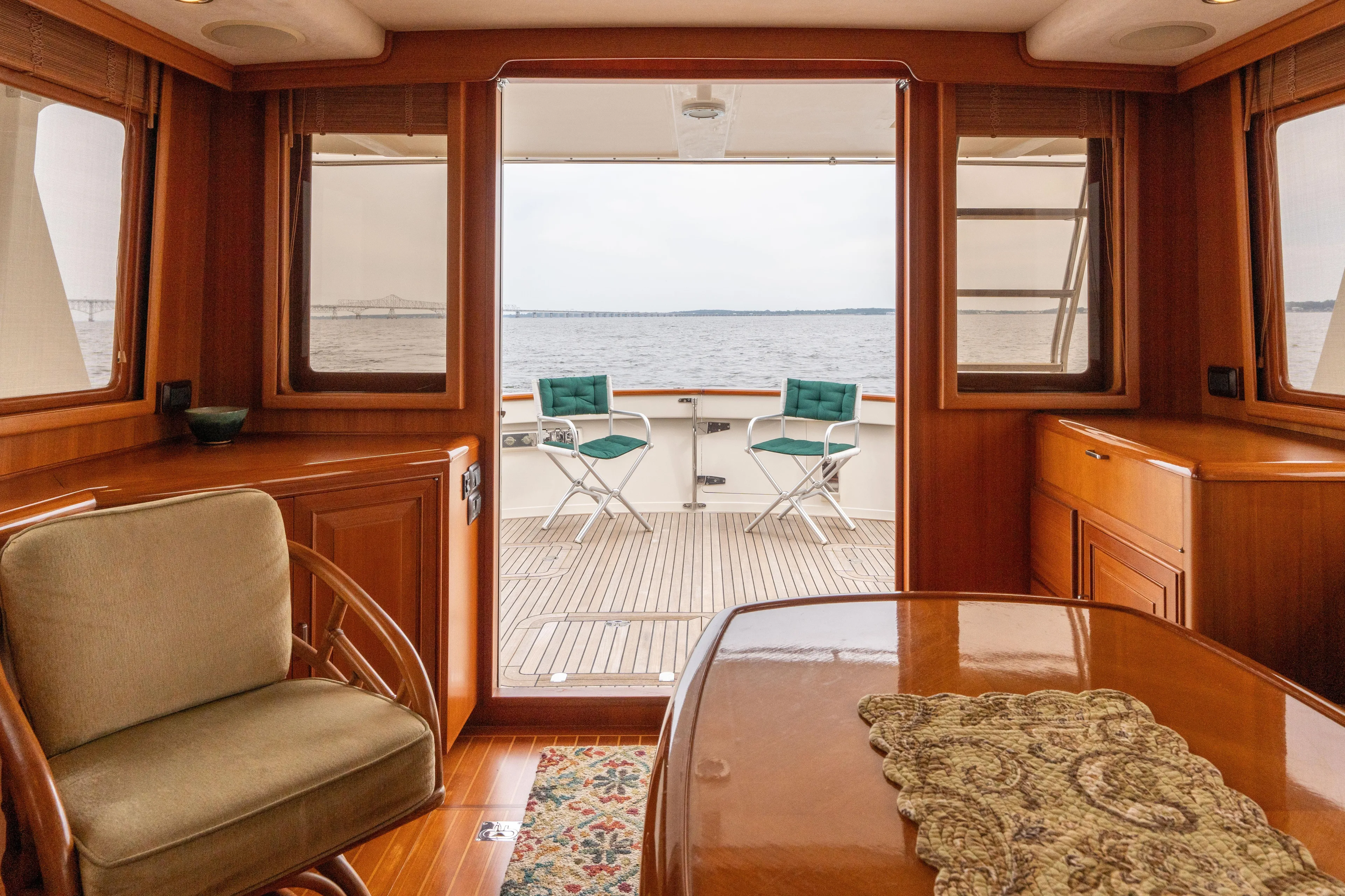 Fiddlesticks Yacht Photos Pics Luxurious interior of 2007 Fleming 55 yacht with ocean view and elegant furnishings.