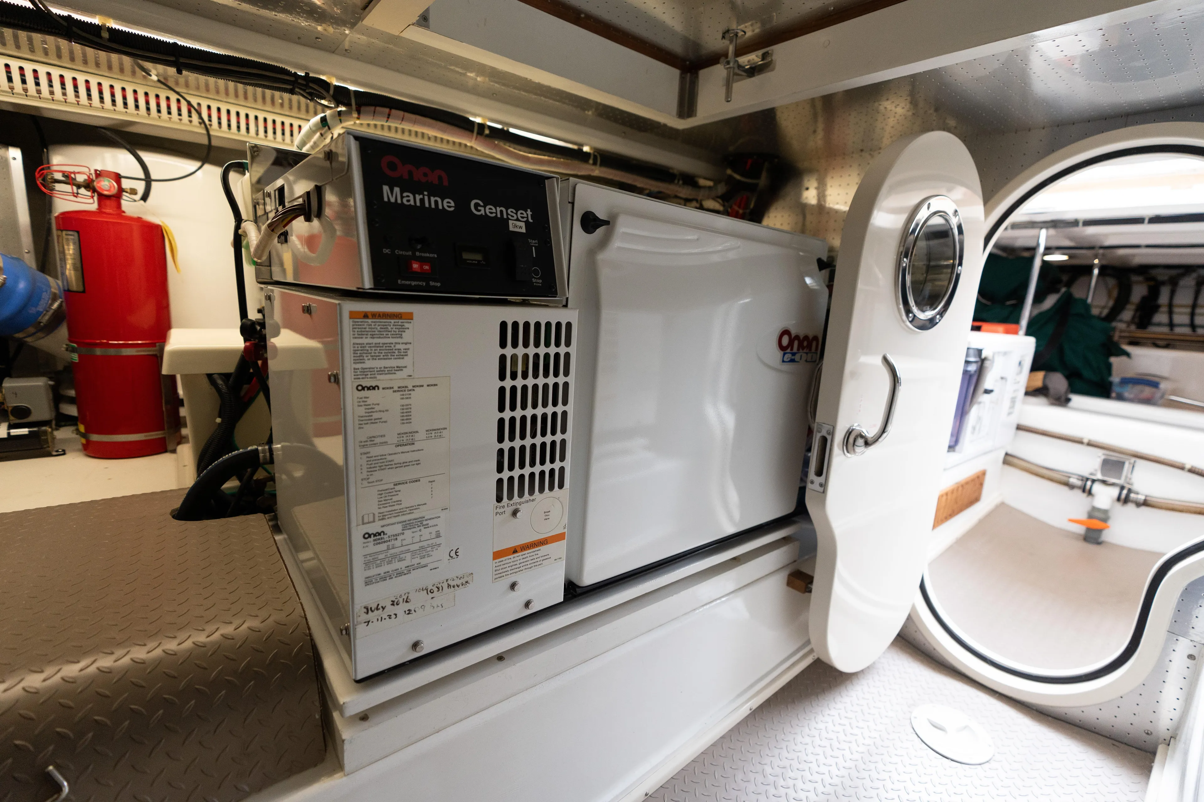 Fiddlesticks Yacht Photos Pics Onan Marine Genset in 2007 Fleming 55 yacht engine room.