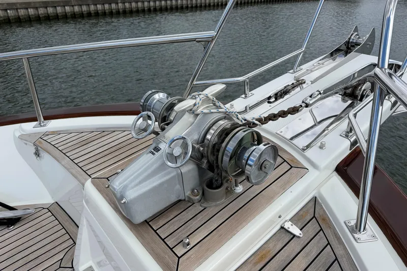 Fiddlesticks Yacht Photos Pics Anchor winch on 2007 Fleming 55 yacht with teak deck and stainless steel fittings.